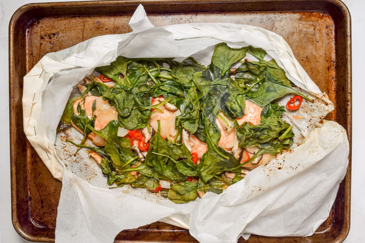 Parchment Steamed Branzino with Ginger, Scallions and Greens - fish recipe by Carolyn Cohen