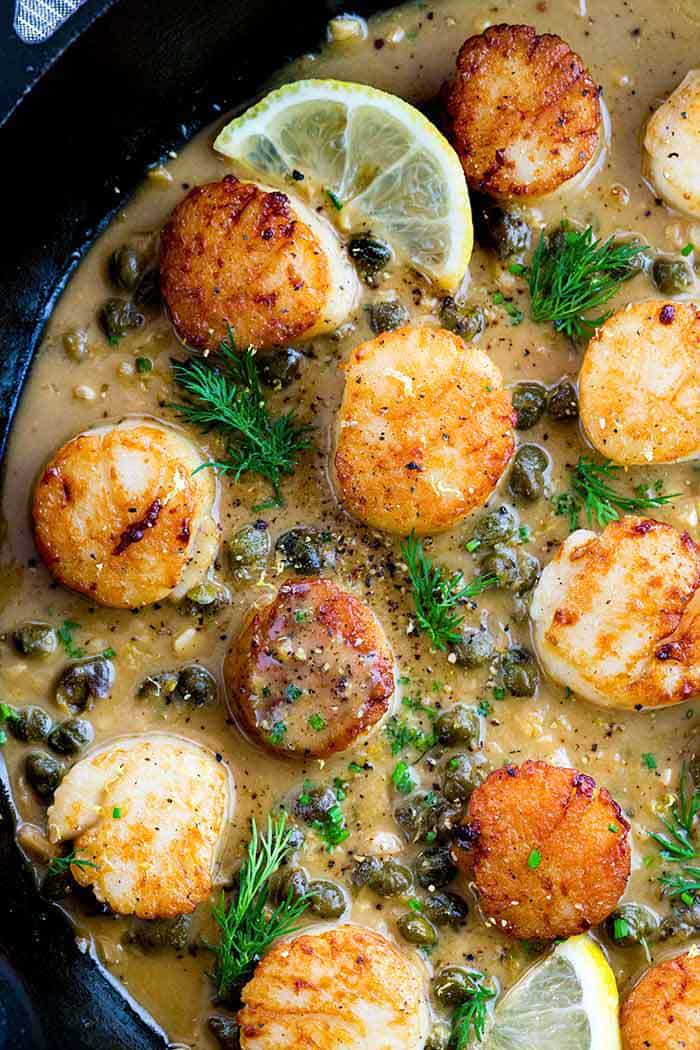 Seared Scallops in White Wine with Mixed Peppercorn Butter Caper - recipe by Carolyn Cohen