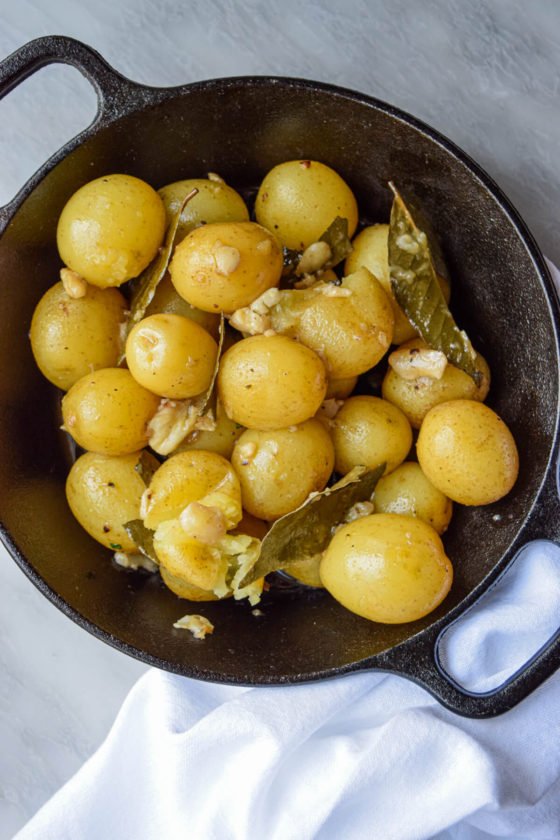 Braised Potatoes with Garlic and Bay Leaves - Delicious Dish