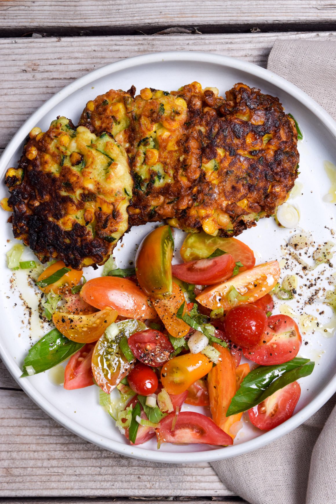 Zucchini Corn Fritters With Tomato Salad Delicious Dish